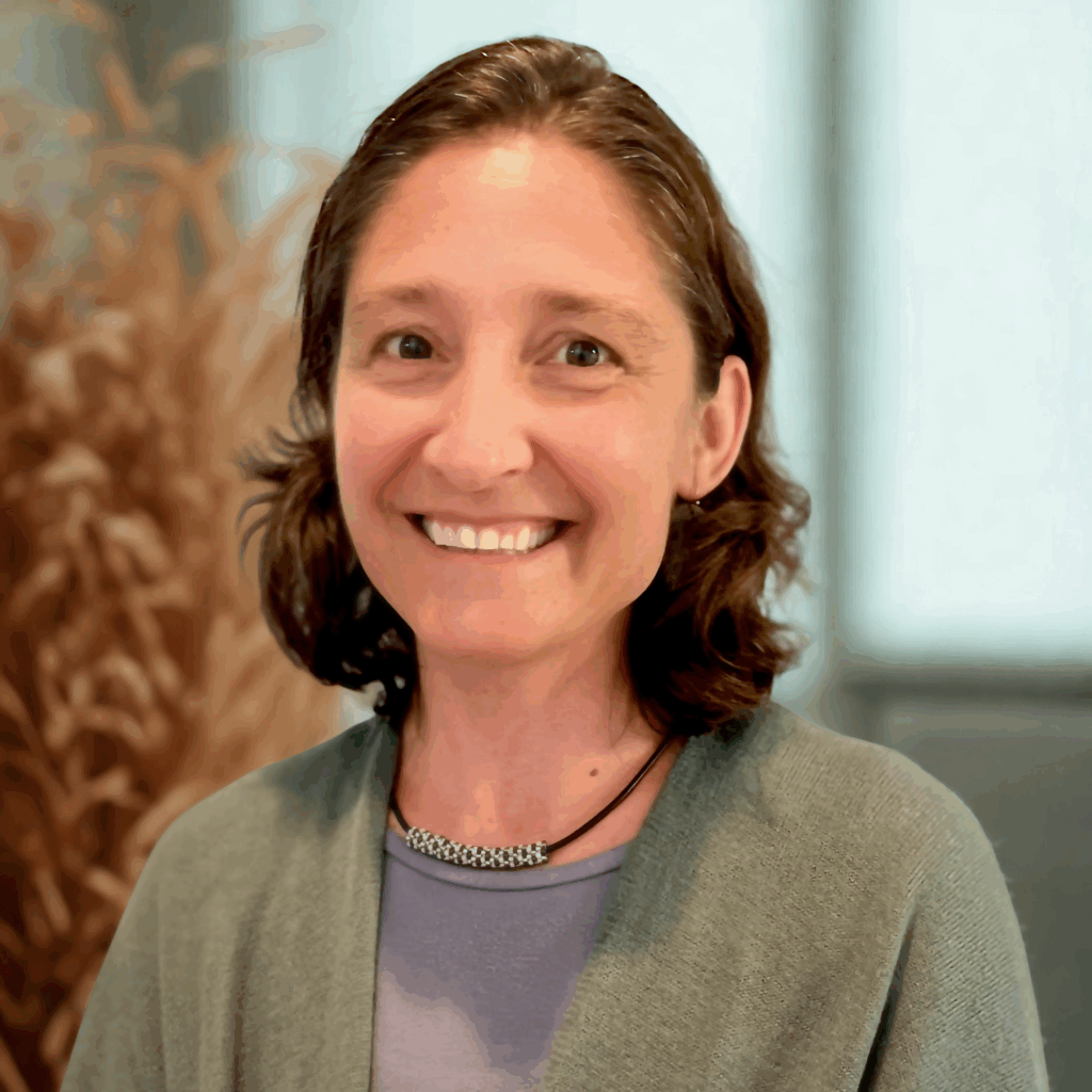 Jeni Rhodes smiling into the camera